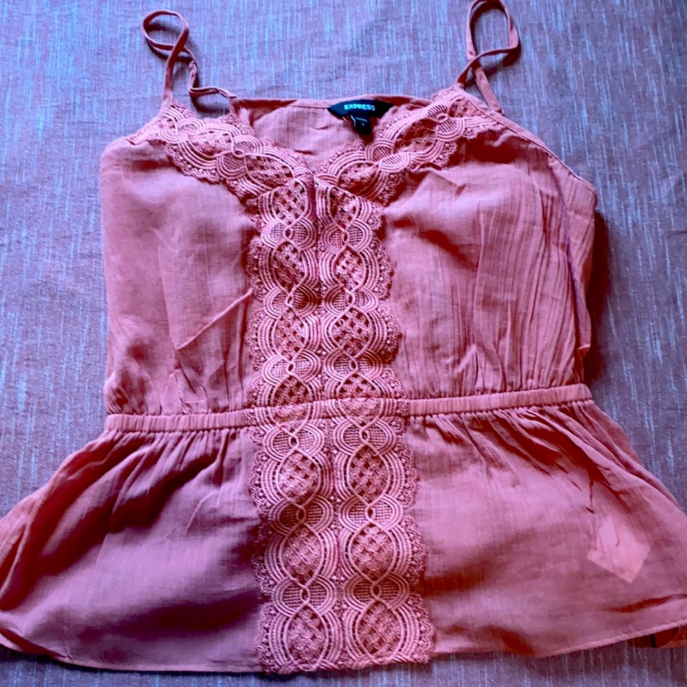 17. Pink peplum tank top with embroidering